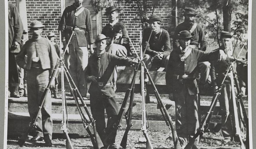 CORRECTS RELEASE DAY TO SATURDAY, NOT SUNDAY - ADVANCE FOR SATURDAY APRIL 4 AND THEREAFTER -This April 1865 image provided by the Library of Congress shows Federal troops standing in front of the Appomattox Court House near the time of Confederate Gen. Robert E. Lee's surrender to Union Lt. Gen. Ulysses S. Grant, in Appomattox, Va. (AP Photo/Library of Congress)