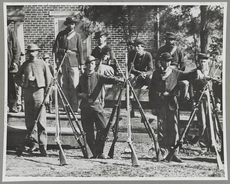 CORRECTS RELEASE DAY TO SATURDAY, NOT SUNDAY - ADVANCE FOR SATURDAY APRIL 4 AND THEREAFTER -This April 1865 image provided by the Library of Congress shows Federal troops standing in front of the Appomattox Court House near the time of Confederate Gen. Robert E. Lee's surrender to Union Lt. Gen. Ulysses S. Grant, in Appomattox, Va. (AP Photo/Library of Congress)