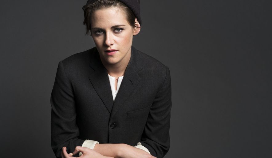 In this Oct. 8, 2014 photo, actress Kristen Stewart poses for a portrait in New York. Stewart stars in "The Clouds of Sils Maria," directed by French filmmaker Olivier Assayas, opening in theaters April 10. (Photo by Drew Gurian/Invision/AP)