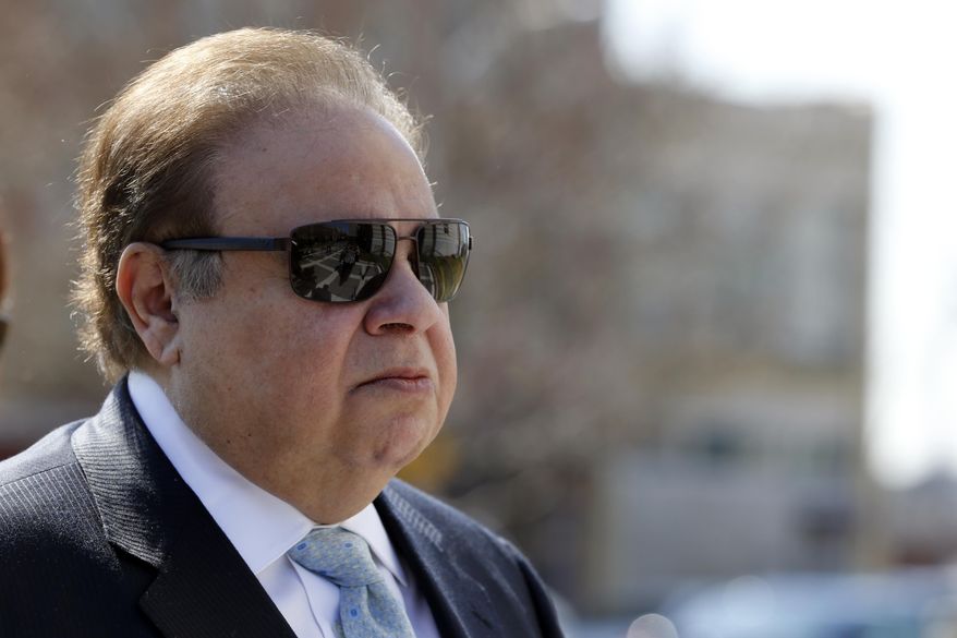 FILE - In this April 2, 2015, file photo, Dr. Salomon Melgen arrives at the Martin Luther King Jr. Federal Courthouse for his arraignment, in Newark, N.J. Melgen was called a miracle worker for his skill restoring sight and a power broker for the deep pockets that brought politicians to his side. Now he’s fighting another label, criminal, after being charged with corruption for allegedly pumping nearly $1 million in gifts and campaign cash to Sen. Bob Menendez in exchange for favors. (AP Photo/Julio Cortez, File)