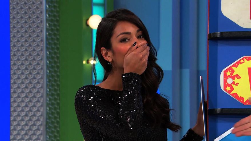 In this photo provided by CBS, model Manuela Arbelaez ensured the price IS right...on the television show, "The Price is Right," by revealing the answer, on Thursday, April 2, 2015. The show airs weekdays (11:00-12:00 Noon, ET; 10:00-11:00 a.m., PT) on the CBS Television Network. (AP Photo/CBS) (AP Photo/CBS)