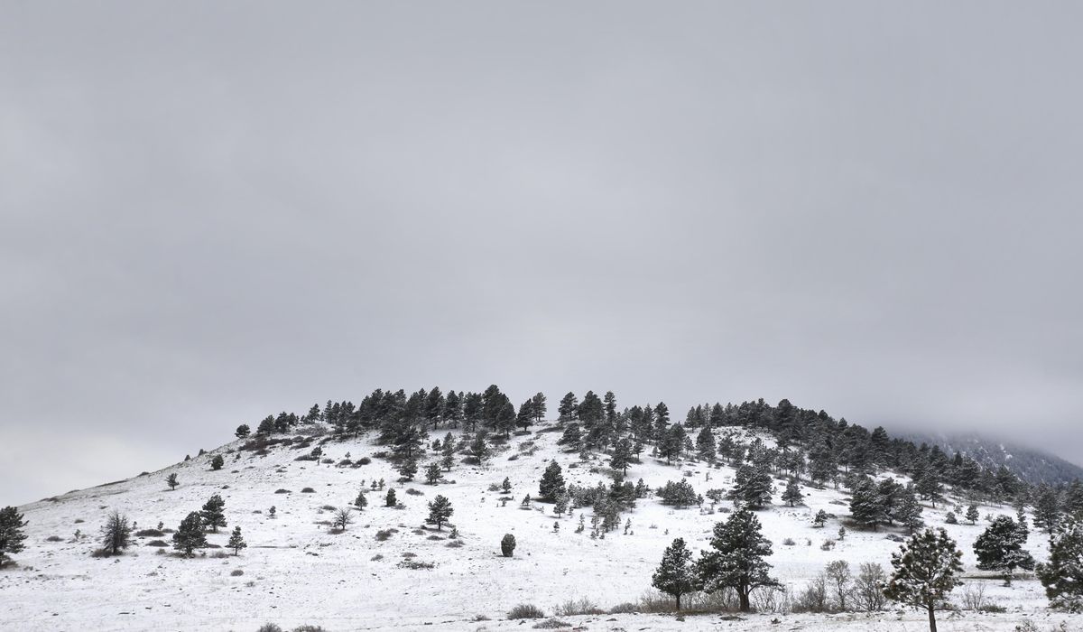 NextImg:Hiker rescued on Colorado peak after getting caught in snow wearing only cotton hoodie