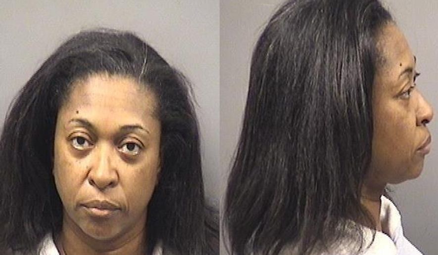 This photo provide by Kankakee County Sheriff's Department shows Tonya Grant. Authorities have arrested Grant, the aunt of Kamron T. Taylor an eastern Illinois jail inmate, on suspicion she helped aided his escape. Taylor, was captured Friday, April 3, 2015, after a nearly three-day manhunt. He escaped from the Jerome Combs Detention Center in Kankakee, where his aunt used to work as a guard. (AP Photo/ Kankakee County Sheriff's Department)