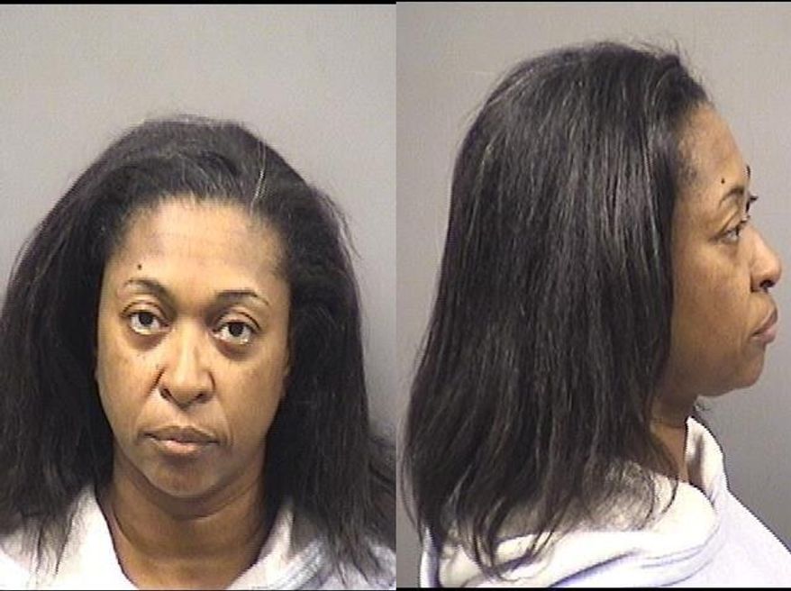 This photo provide by Kankakee County Sheriff's Department shows Tonya Grant. Authorities have arrested Grant, the aunt of Kamron T. Taylor an eastern Illinois jail inmate, on suspicion she helped aided his escape. Taylor, was captured Friday, April 3, 2015, after a nearly three-day manhunt. He escaped from the Jerome Combs Detention Center in Kankakee, where his aunt used to work as a guard. (AP Photo/ Kankakee County Sheriff's Department)