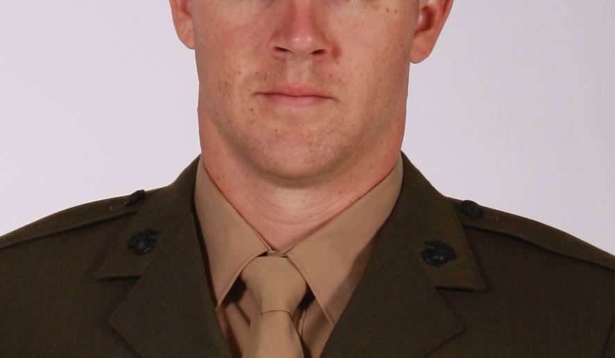 FILE - This undated file image provided by the U.S. Marine Corps shows Staff Sgt. Andrew Seif, 26, who was one of three Michigan Marines killed in a helicopter crash March 10, 2015, during training in Florida. Eleven service members were killed in all. A memorial service for Seif is scheduled for Saturday, April 11, 2015, at Our lady of the Lake Catholic Church in Holland, Mich. His burial is scheduled for April 14 at Arlington National Cemetery. (AP Photo/U.S. Marine Corps)
