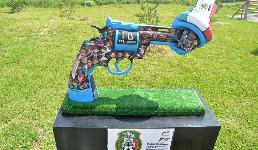 A knotted gun sculpture painted by Mexican artist Paola Delfin is displayed at a park in the city of Monterrey, Mexico, Thursday April 2, 2015. Thirteen knotted gun sculptures painted by various artists are on display in this city that for years has been plagued with violence generated by warring drug cartels. The original knotted gun sculpture was designed and created by Carl Fredrik Reutersward as a memorial to John Lennon after he was shot and killed in 1980 and is now displayed outside of the United Nations headquarters in New York City. (AP Photo/Emilio Vazquez)