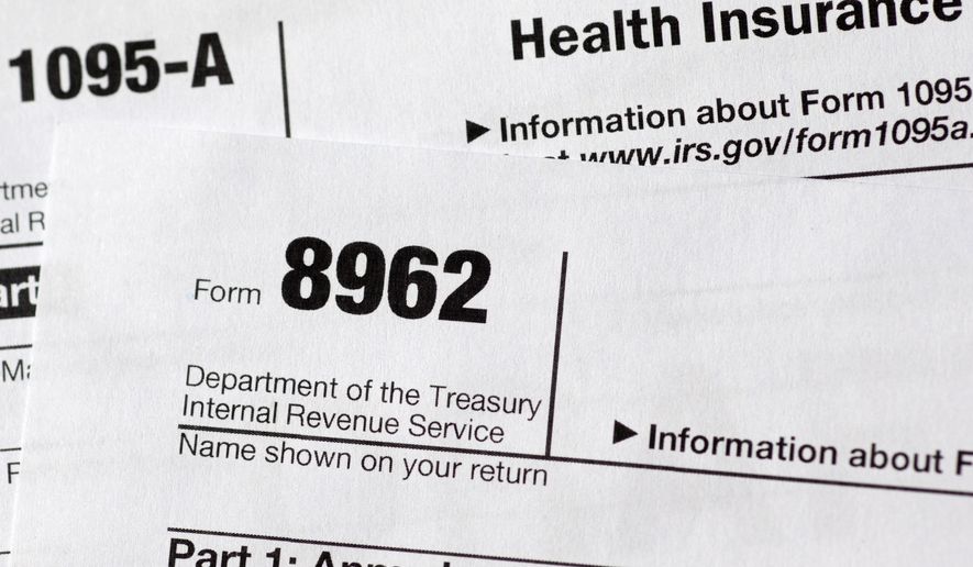 FILE - In this Aug. 21, 2014 file photo shows health care tax forms 8962 and1095-A, in Washington. As the April 15 tax deadline nears, people who got help paying for health insurance under President Barack Obama's law are seeing the direct effect on their refunds _ hundreds of dollars, for better or worse. With subsidies tied to income, consumers must accurately estimate what they will make for the coming year _ and that's been a challenge. Guess on the low side, get more help now with premiums, but owe money later at filing time. Overestimate income, expect bucks back from the taxman. (AP Photo/Carolyn Kaster)