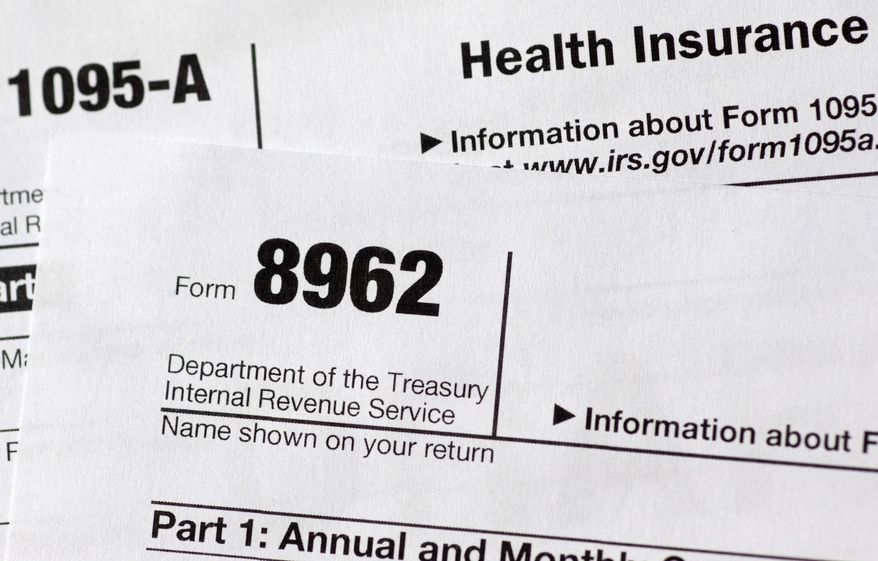 FILE - In this Aug. 21, 2014 file photo shows health care tax forms 8962 and1095-A, in Washington. As the April 15 tax deadline nears, people who got help paying for health insurance under President Barack Obama's law are seeing the direct effect on their refunds _ hundreds of dollars, for better or worse. With subsidies tied to income, consumers must accurately estimate what they will make for the coming year _ and that's been a challenge. Guess on the low side, get more help now with premiums, but owe money later at filing time. Overestimate income, expect bucks back from the taxman. (AP Photo/Carolyn Kaster)