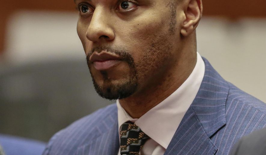 File- This March 23, 2015, file photo shows former NFL safety Darren Sharper appearing in Los Angeles Superior Court. Sharper is scheduled to make his first appearance in U.S. District Court in New Orleans to face federal charges that he drugged women in order to rape them.  A member of the Saints team that won the Super Bowl in 2010, Sharper was set to appear Monday, April 6, 2015, before a federal magistrate judge. (AP Photo/Nick Ut, Pool, File)