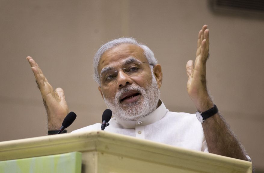 India’s Prime Minister Narendra Modi speaks during a conference by The Environment Ministry in New Delhi, India, Monday, April 6, 2015. (AP Photo/Saurabh Das) ** FILE **