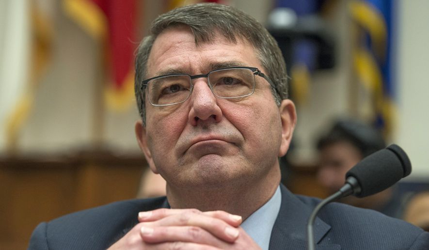 FILE - In this March 18, 2015 file photo, Defense Secretary Ash Carter listens on Capitol Hill in Washington. To put a spotlight back on Asia, Carter will visit Japan and South Korea this week, the first of a string of planned trips to the region during his first year as Pentagon chief. He will visit India and attend an international security conference in Singapore in May, and he may visit China later in the year. (AP Photo/Molly Riley, File)