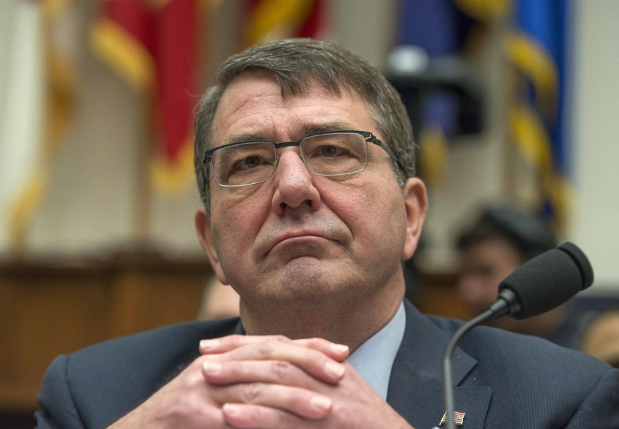 FILE - In this March 18, 2015 file photo, Defense Secretary Ash Carter listens on Capitol Hill in Washington. To put a spotlight back on Asia, Carter will visit Japan and South Korea this week, the first of a string of planned trips to the region during his first year as Pentagon chief. He will visit India and attend an international security conference in Singapore in May, and he may visit China later in the year. (AP Photo/Molly Riley, File)