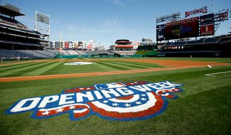 An opening day logo adorns the field at Nationals Park before a baseball game between the Washington Nationals and the New York Mets on Monday, April 6, 2015, in Washington. (AP Photo/Andrew Harnik)