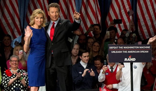 &#x27;Message of liberty&#x27; Sen. Rand Paul, joined by wife Kelley Ashby, announced his presidential candidacy in Louisville, Kentucky, on Tuesday, becoming the second tea party favorite to enter the Republican race. (Associated Press)  ** FILE **