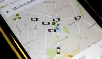 In this Wednesday, March 18, 2015, file photo, the Uber app displays cars available to make a pickup in downtown Manhattan on a smart phone, in New York. A new report by expense management system provider Certify shows that 47 percent of the ground transportation rides by its users in March were through Uber. (AP Photo/Mary Altaffer, File)