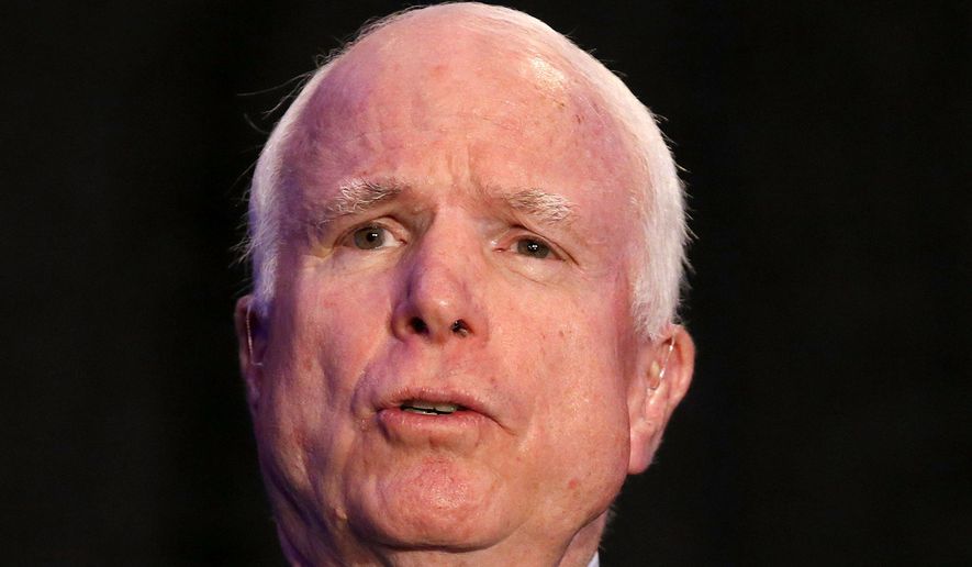 Sen. John McCain, R-Ariz. answers a question from the audience after formally announcing his candidacy for re-election in 2016 at an Arizona Chamber of Commerce luncheon Tuesday, April 7, 2015, in Phoenix. McCain announced Tuesday that he will run for re-election in 2016, making official a move that has been widely expected for the Republican as he looks to extend his nearly three-decade career in the Senate.  (AP Photo/Ross D. Franklin)