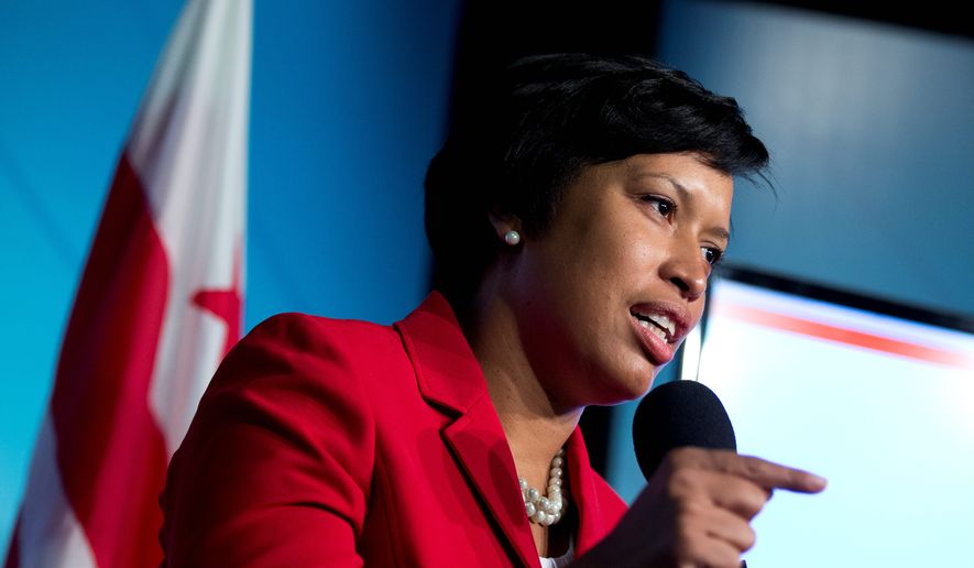 D.C. Mayor Muriel Bowser said attacking homelessness and affordable housing were two of her guiding priorities when creating her first budget for the city, which proposes sales tax and parking garage tax hikes, and cuts some funding to the University of D.C. (Associated Press) **FILE**