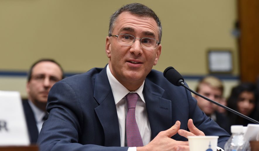 MIT economist Jonathan Gruber, a key architect of Obamacare, testifies on Capitol Hill in Washington, Tuesday, Dec. 9, 2014, before the House Oversight Committee health care hearing. (AP Photo/Molly Riley) ** FILE **