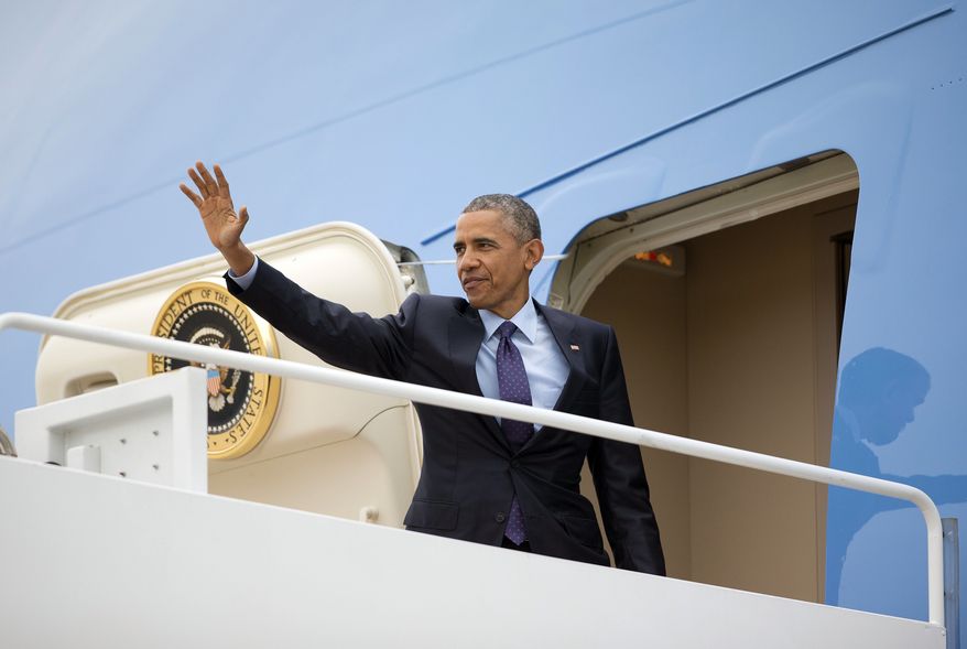 President Barack Obama waves as he boards Air Force One, Wednesday, April 8, 2015 at Andrews Air Force Base, Md. Obama is traveling to Jamaica first before going to Summit of the America meeting in Panama, which begins Friday. (AP Photo/Pablo Martinez Monsivais)