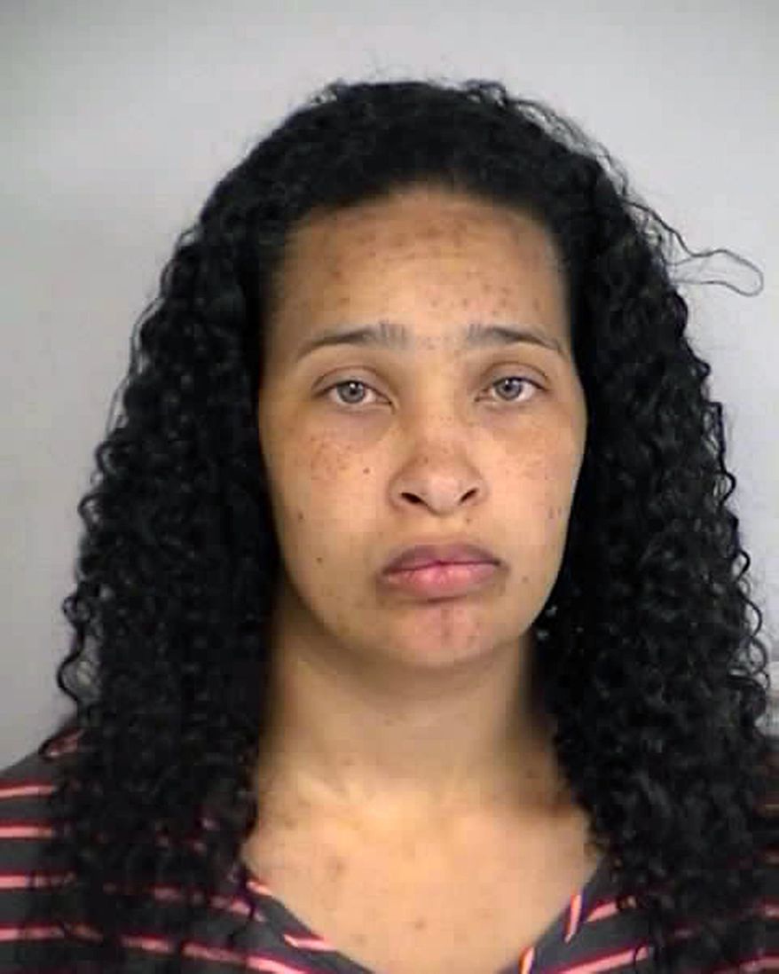This undated photo provided by the North Las Vegas Police Department shows Kellie Phillips, 38. Phillips, the mother in an apparent child abandonment case where a 3-year-old girl was found dead in a North Las Vegas home has been arrested. Police said Phillips surrendered to police at her attorney's Las Vegas office. The five children between ages 1 and 9 in her care were also there in good health. They are now in protective custody. Phillips is facing two charges of child-abuse resulting in harm or death. (AP Photo/North Las Vegas Police Department)