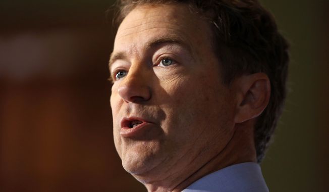 Sen. Rand Paul, Kentucky Republican, is under fire from the NRA due to his support of the NAGR, a rival gun rights advocacy group. (Associated Press)