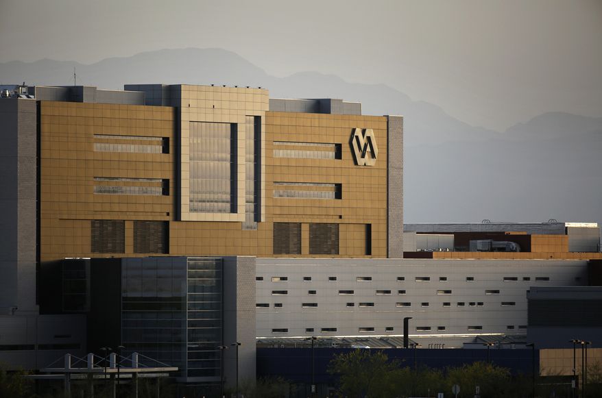 This April 1, 2015, file photo shows the Department of Veterans Affairs medical facility in North Las Vegas. (AP Photo/John Locher) ** FILE **