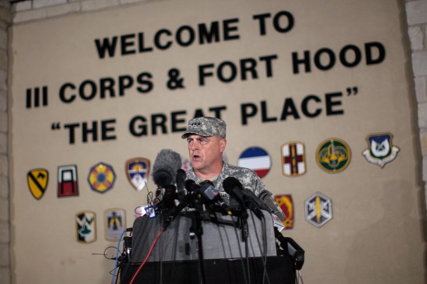 In this April 2, 2014, file photo, Lt. Gen. Mark Milley, commanding general of III Corps and Fort Hood, speaks with the media outside of an entrance to the Fort Hood military base following a shooting that occurred inside, in Fort Hood, Texas. (AP Photo/Tamir Kalifa, File)