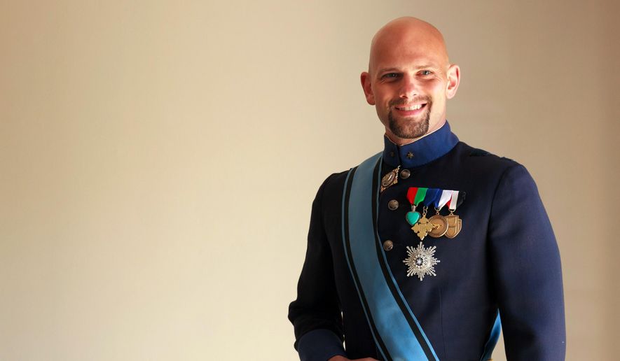 This April 8, 2015, photo shows His Royal Highness the Grand Duke of Westarctica, aka Travis McHenry, posing in his uniform in West Hollywood, Calif. McHenry will be among the largest gathering of world leaders this side of the United Nations, convening Saturday, April 11, 2015, at MicroCon 2015, what organizers say is the first North American gathering of micronations, those tiny little countries that pretty much nobody but the people who rule them believe really exist. (AP Photol/Gabriela Alvarez)