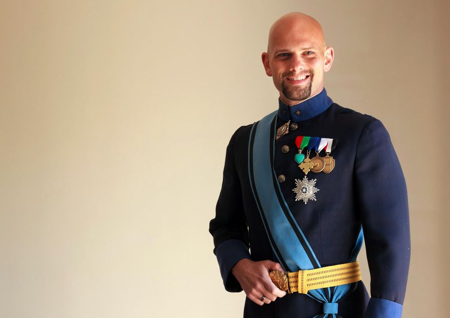 This April 8, 2015, photo shows His Royal Highness the Grand Duke of Westarctica, aka Travis McHenry, posing in his uniform in West Hollywood, Calif. McHenry will be among the largest gathering of world leaders this side of the United Nations, convening Saturday, April 11, 2015, at MicroCon 2015, what organizers say is the first North American gathering of micronations, those tiny little countries that pretty much nobody but the people who rule them believe really exist. (AP Photol/Gabriela Alvarez)