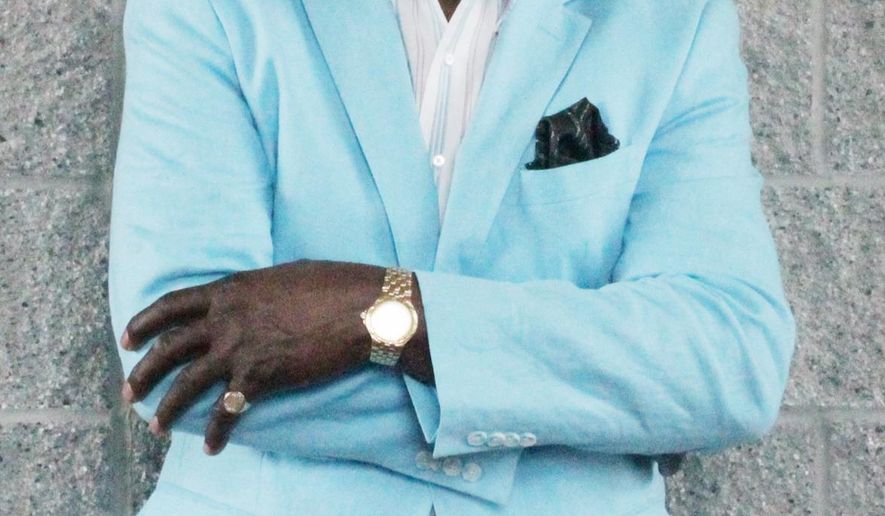 ADVANCED FOR RELEASE MONDAY, APRIL 13, 2015 Florence performer Clay Brown said he is trying to keep the music of the 50s and 60s alive. He has performed across the United States with several bands. (AP Photo/Morning News, Shamira McCray) LOCAL TV OUT;MANDATORY CREDIT;NO SALES