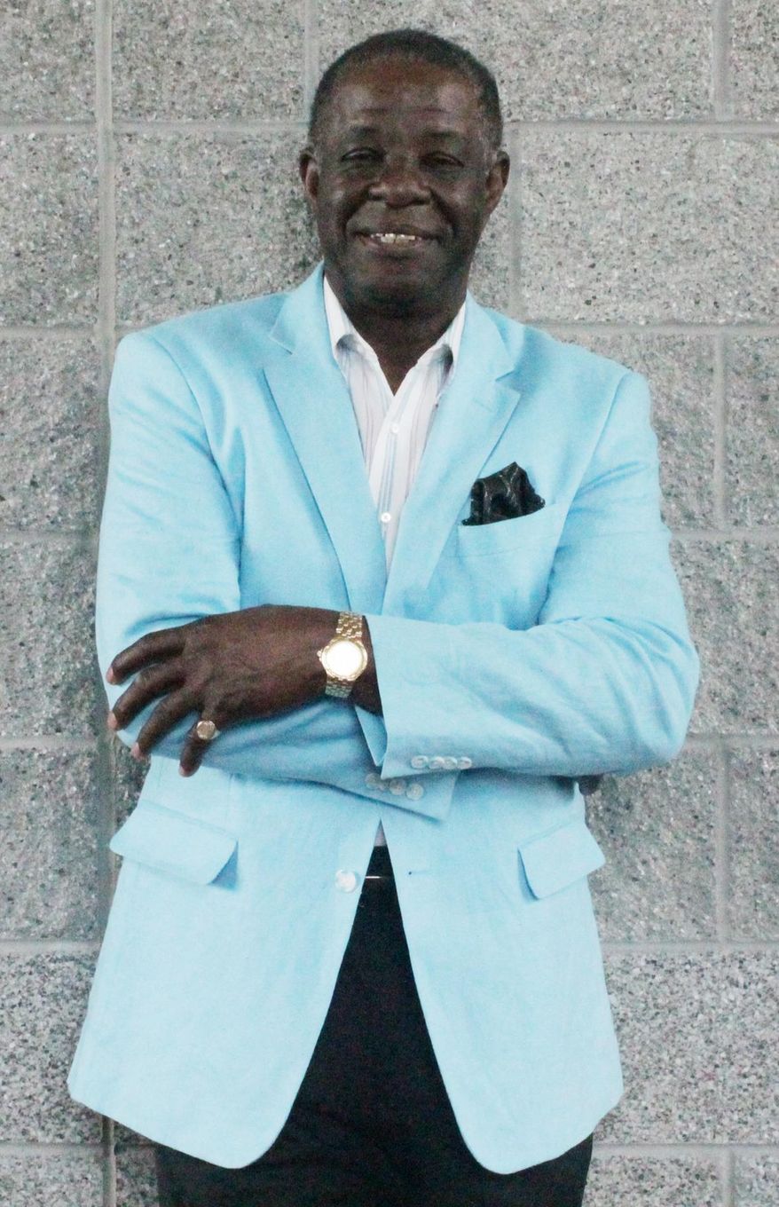 ADVANCED FOR RELEASE MONDAY, APRIL 13, 2015 Florence performer Clay Brown said he is trying to keep the music of the 50s and 60s alive. He has performed across the United States with several bands. (AP Photo/Morning News, Shamira McCray) LOCAL TV OUT;MANDATORY CREDIT;NO SALES