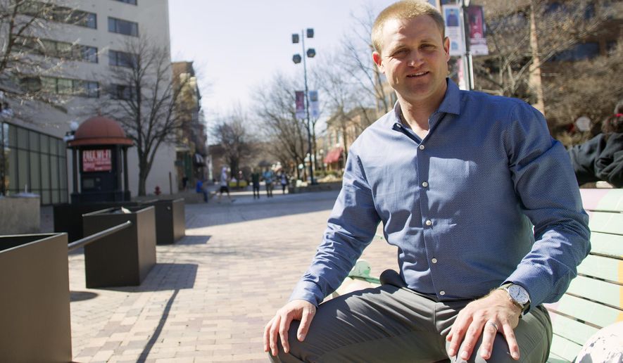 Nate Kaeding poses for a photo on Wednesday, April 1, 2015 in Iowa City, Iowa. Kaeding will graduate from the University of Iowa&#39;s Tippe College of Business in May and was recently named the Iowa City Downtown District&#39;s retail development coordinator.    (AP Photo/Iowa City Press-Citizen, David Scrivner)  NO SALES