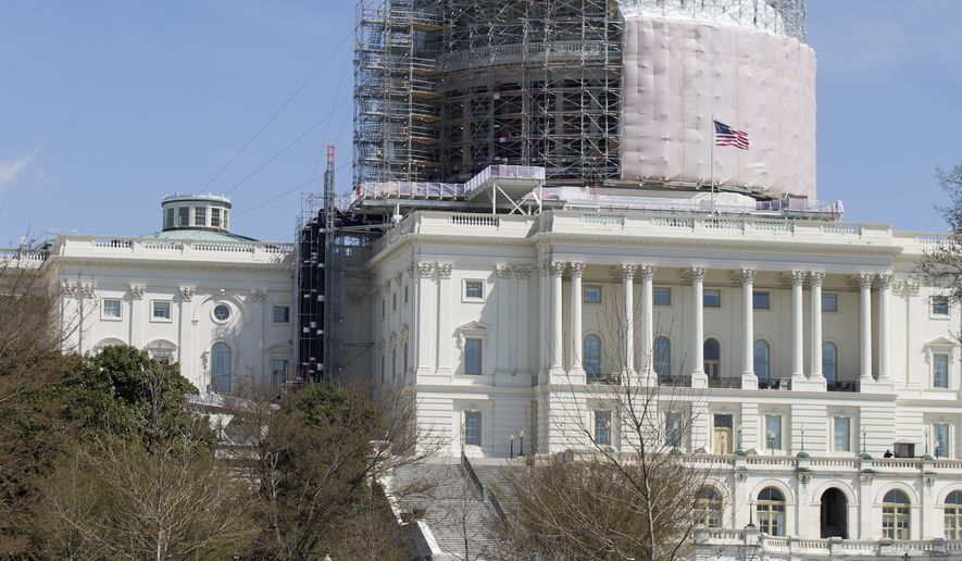 Members of law enforcement and emergency services gather and a parameter created around the west front of the U.S. Capitol as the U.S. Capitol is on lockdown, Saturday, April 11, 2015, in Washington. Police say the U.S. Capitol is on lockdown as a precaution after shots were fired in what appears to be an attempted suicide. Capitol Police spokeswoman Kimberly Schneider says the suspected shooter was "neutralized" after sustaining a self-inflicted gunshot wound. It's unclear whether the man is dead. No one else is believed to be hurt. (AP Photo/Carolyn Kaster)