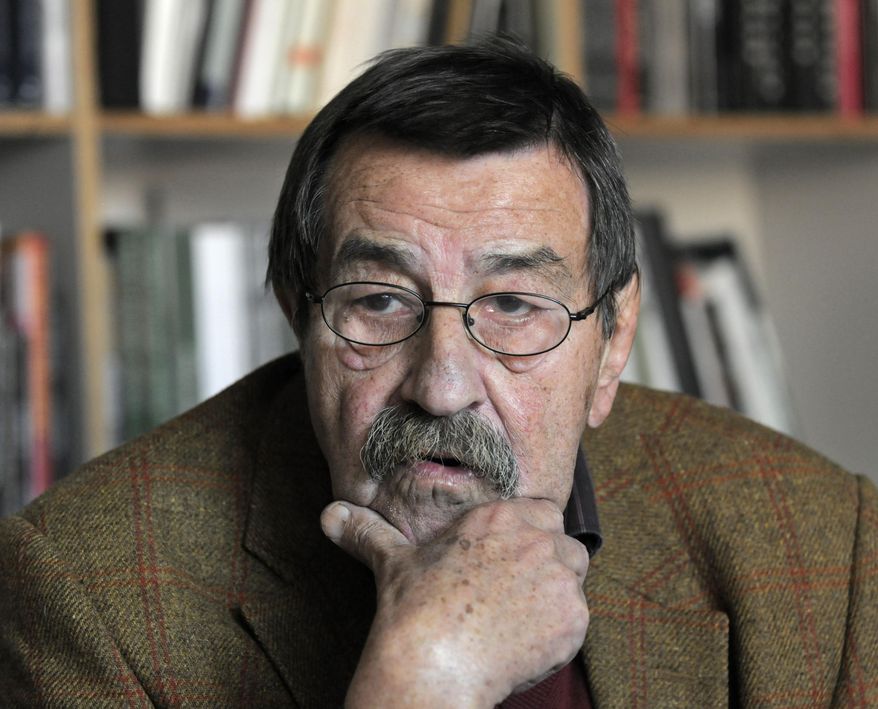 FILE - The Oct. 15, 2009 file photo shows German writer and Nobel price laureate for literature Guenter Grass during an interview with journalists of the Associated Press in the library of Steidl publishers in Goettingen, Germany. Nobel laureate Grass has died his publishing house confirmed Monday, April 13, 2015. He was 87. (AP Photo/Jens Meyer)