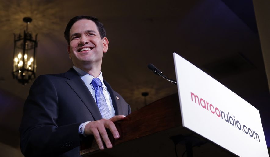 Florida Sen. Marco Rubio smiles during his  announcement he is running for the Republican nomination, at a rally at the Freedom Tower, Monday, April 13, 2015, in Miami. (AP Photo/Alan Diaz)