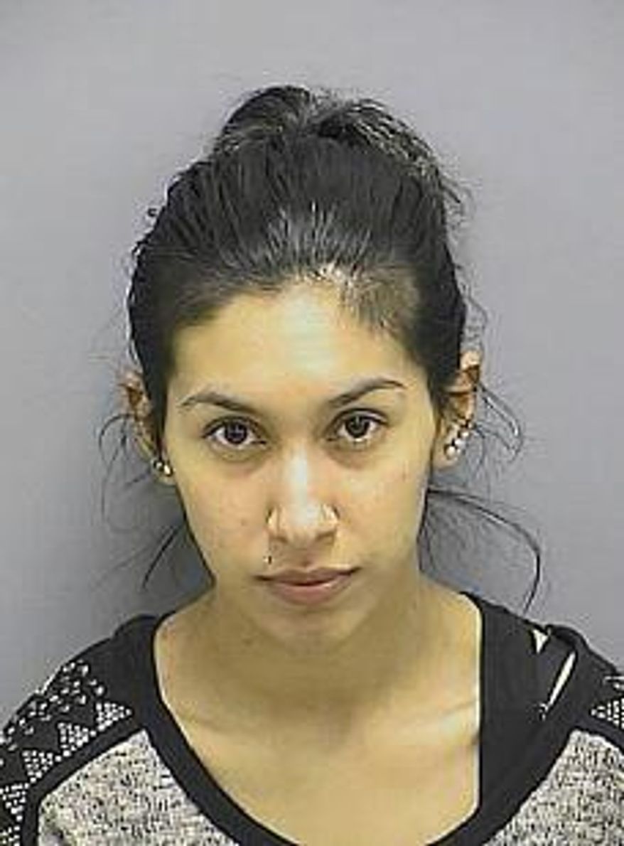 This handout photo provided by the Frederick, Md., Sheriff’s Office, taken March 17, 2014, shows Stephanie Ramirez Williams. A judge in Frederick, Md. has sentenced a woman to 20 years in prison for failing to prevent her husband from killing their 21-month-old daughter Anayah in a case that prompted state child-welfare reform legislation. Stephanie Williams was sentenced Tuesday. She was convicted last week in a plea deal of first-degree child abuse resulting in death. (Joseph Hayer, Frederick County, Md., Sheriff’s Office via AP)