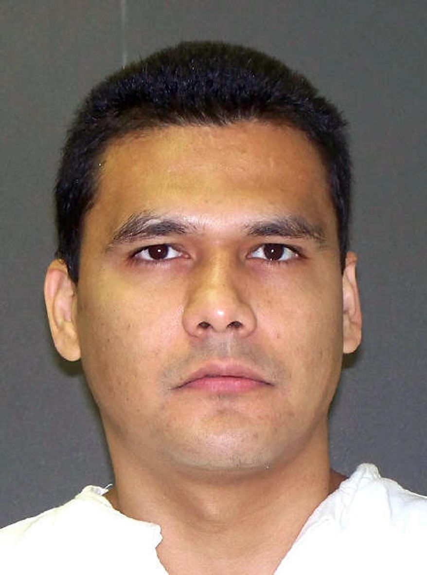 This undated handout photo provided by the Texas Department of Criminal Justice shows Manuel Garza Jr. Garza is scheduled to be executed for the 2001 shooting death of San Antonio, Texas, SWAT officer John “Rocky” Riojas. (Texas Department of Criminal Justice via AP)
