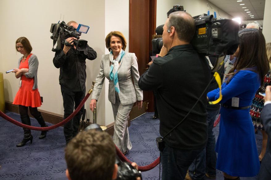 House Minority Leader Nancy Pelosi of Calif. arrives on Capitol Hill in Washington, Tuesday, April 14, 2015, for a House Democratic Caucus meeting to discuss the Iran nuclear deal with Secretary of State John Kerry. Kerry, who played a leading role in getting a framework agreement with Iran last month, personally pleaded with House Republicans and Democrats on Monday to give the Obama administration more time and room to negotiate a final deal. Kerry met in a closed-door session with members of the House and was to meet with senators on Tuesday before the committee debates the bill. (AP Photo/Andrew Harnik)