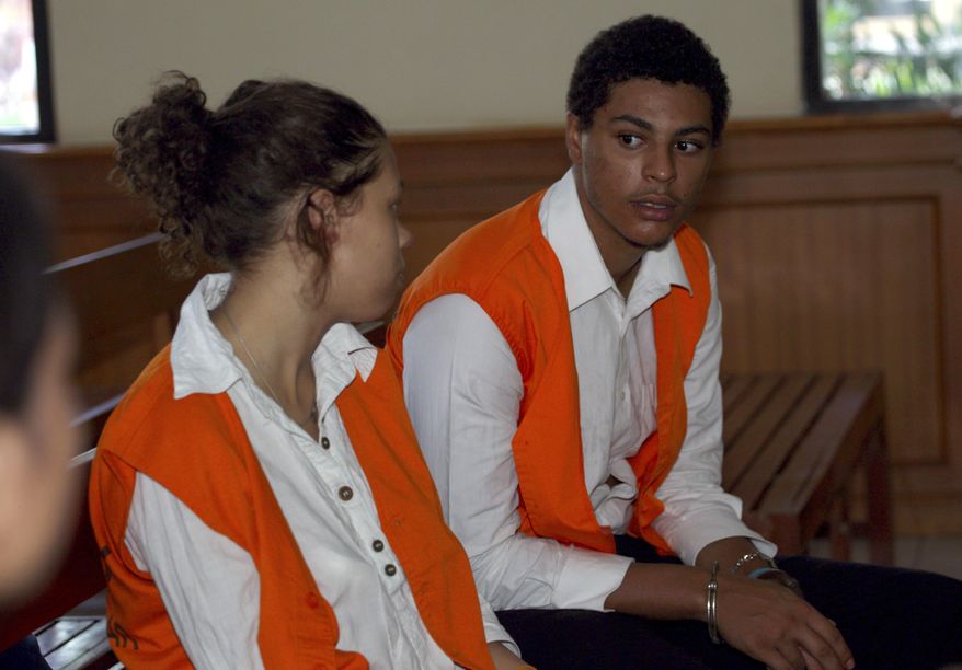 Tommy Schaefer, right, talks to Heather Mack, both from Chicago, Ill. in a court oom for their trial in Bali, Indonesia, Tuesday, April 14, 2015. Lawyers representing the American couple, Mack and her boyfriend Tommy Schaefer, on trial for murdering the woman’s mother Sheila von Wiese-Mack, 62, have argued that there is no evidence of premeditated murder and sought light sentences. State prosecutors are seeking jail sentences of 18 years for Schaefer and 15 years for Mack for the murder in August on the resort island of Bali. (AP Photo/Firdia Lisnawati)