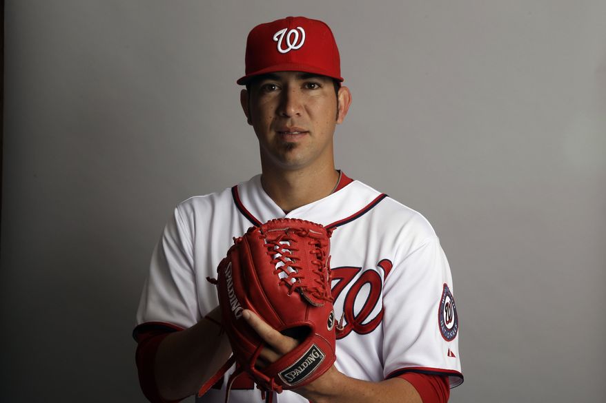 This is a 2012 photo of Rafael Martin of the Washington Nationals baseball team. This image reflects the Nationals' active roster as of Tuesday, Feb. 28, 2012, when this image was taken. (AP Photo/Matt Slocum)