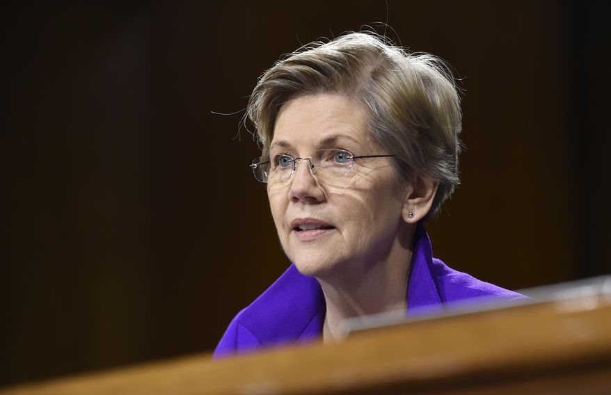 FILE - In this Feb. 24, 2015 file photo, Sen. Elizabeth Warren, D-Mass. is seen on Capitol Hill in Washington. The Corinthian 100 “strikers” who are refusing to pay back their loans have created a test case for how the department handles such borrowers. The former for-profit students want the department to discharge their loans, and provide relief to others who have been “subjected to illegal practices by their schools.” Their effort is backed by thirteen U.S. senators led by Sen. Elizabeth Warren. (AP Photo/Susan Walsh, File)