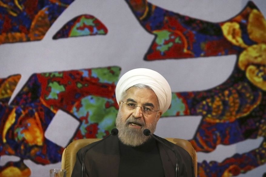 FILE - In this Sunday, April 12, 2015 file photo, Iranian President Hassan Rouhani speaks at a ceremony to commemorate the late Khadijeh Saghafi, wife of late revolutionary founder Ayatollah Khomeini, in Tehran, Iran. Rouhani has dismissed pressure from the U.S. Congress over a preliminary deal on Iran&#39;s nuclear program, saying that Tehran is dealing with world powers not American lawmakers. (AP Photo/Vahid Salemi, File)