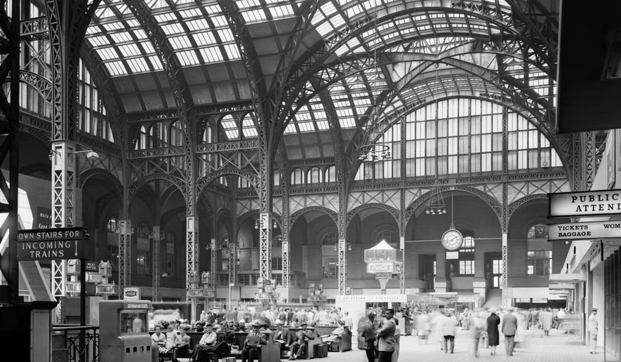 FILE - This April 24, 1962 file photo provided by theLibrary of Congress shows the main concourse of the original Pennsylvania Station in New York. The original station, a Beaux Arts masterpiece of soaring beauty, classical columns and natural light, was torn down in 1963. Fifty years ago Mayor Robert Wagner signed the Landmarks Law, ending decades of hard-fought efforts to save New York City’s historic character but not before some major architectural losses, including the massive McKim, Mead & White-designed Pennsylvania Station. (Cervin Robinson/Library of Congress VIA AP, File)