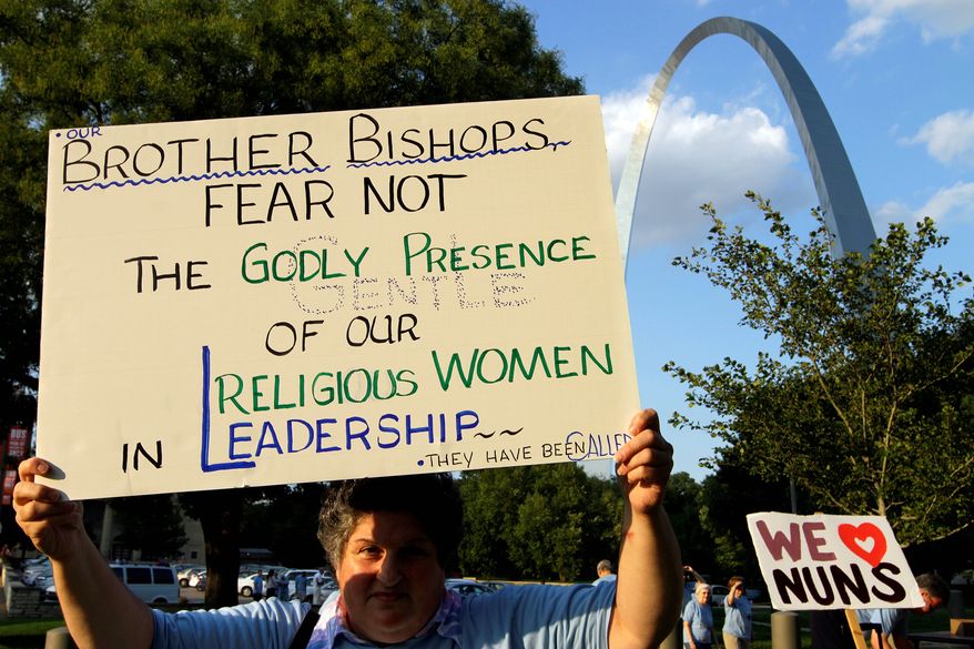 Supporters of the Leadership Conference of Women Religious participated in a vigil August 2012 in St. Louis. Thursday&#x27;s conciliatory statement was in sharp contrast to the 2012 Vatican mandate, which warned that the group was in a grave doctrinal crisis. The Vatican probationary period ended two years ahead of schedule. (Associated Press)