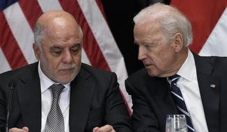 Vice President Joe Biden talks with Iraq&#39;s Prime Minister Haider Al-Abadi during a session of the U.S.-Iraq Higher Coordinating Committee, Thursday, April 16, 2015, in the Indian Treaty Room of the Eisenhower Executive Office Building on the White House complex in Washington. (AP Photo/Susan Walsh) ** FILE **