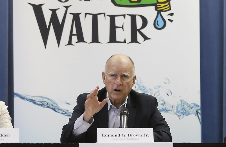 Gov. Jerry Brown responds to a question after a meeting with businesses affected by the drought at his Capitol office in Sacramento, Calif., Thursday, April 16, 2015. Cities expected to slash water use in the drought are revolting against Brown’s mandatory water restrictions, and dozens of agencies are telling water regulators that their assigned water use targets are unrealistic and unfair. (AP Photo/Rich Pedroncelli)