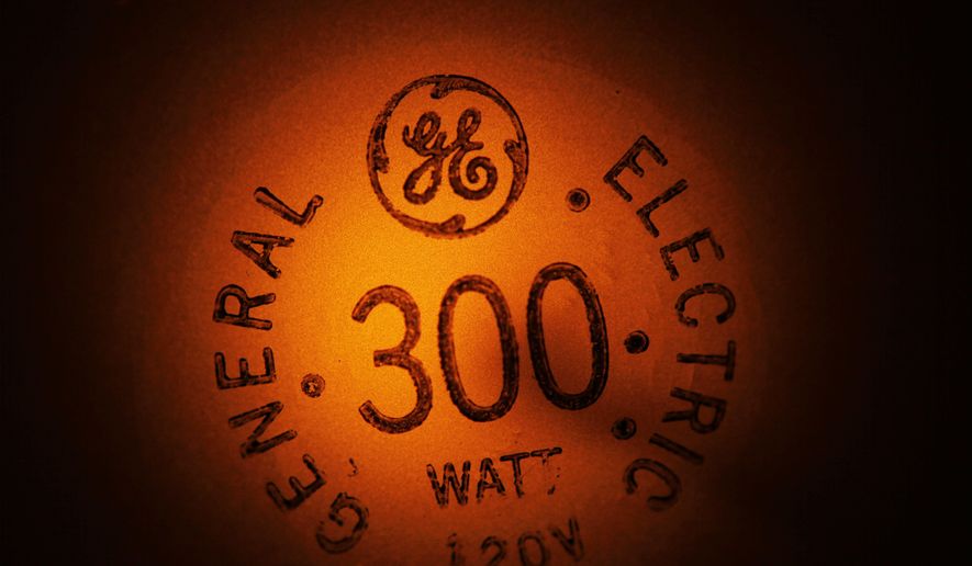 In this photo taken Jan. 14, 2011, a General Electric light bulb glows as it is turned off in Buffalo, N.Y. (AP Photo/David Duprey, File)