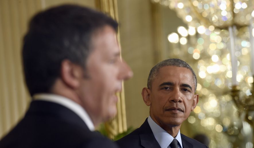 President Barack Obama listens as Italian Prime Minister Matteo Renzi speaks during their joint news conference in the East Room of the White House in Washington, Friday, April 17, 2015. The leaders discussed Europe&#39;s economy, a pending trade pact between the U.S. and Europe, climate change and energy security.(AP Photo/Susan Walsh)