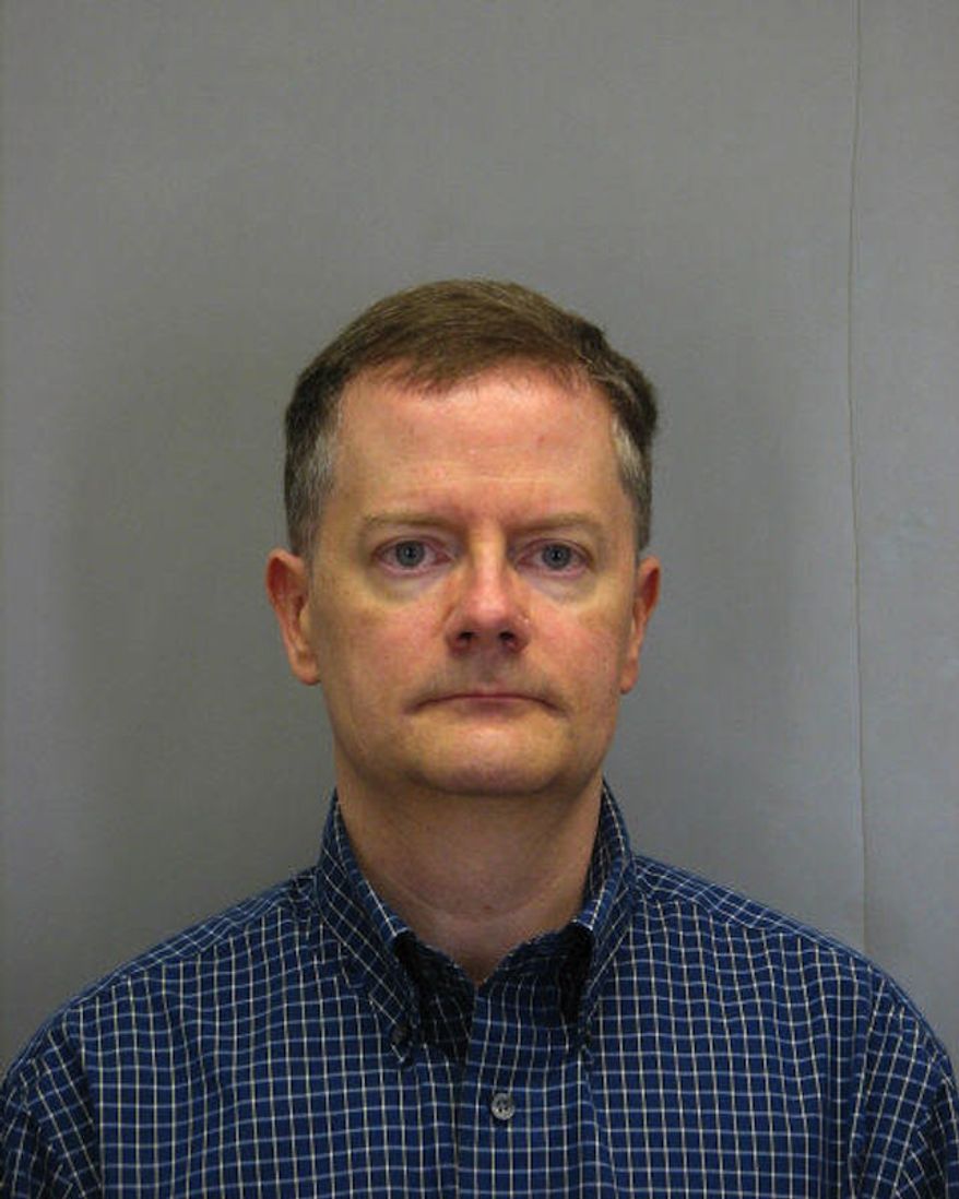 William "Bud" Walker, a Fairfax County police officer who worked as both the spokesman of the agency and a school resource officer, has resigned following his arrest on child pornography charges. (Fairfax County Police Department)