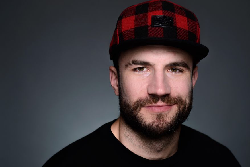 In this Monday, Nov. 23, 2014 photo, country singer Sam Hunt poses for a portrait in New York. (Photo by Scott Gries/Invision/AP)